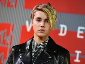 In this Aug. 30, 2015 file photo, Justin Bieber arrives at the MTV Video Music Awards in Los Angeles. (Photo by Jordan Strauss/Invision/AP, File)