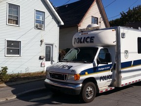 Police investigate a child porn production case at a Brook St. home in Gatineau on Wednesday. A 24-year-old man is under arrest. (SAM COOLEY Ottawa Sun / Postmedia Network)