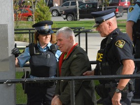 Boris Panovski, charged with murder and attempted murder, enters the courthouse in Goderich for a preliminary hearing on Oct. 7, 2015. (John Miner, The London Free Press)