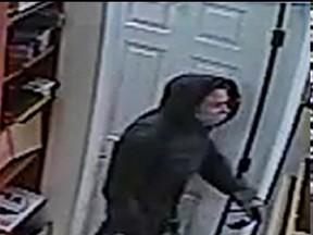 Ottawa cops say this image shows the suspect in a Baseline Rd. pharmacy robbery on Sept. 25. (OTTAWA :POLICE submitted image)