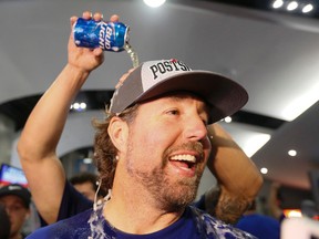 R.A. Dickey and the Blue Jays celebrate their Wild Card clinch after their victory today against Tampa Bay Rays at the Rogers Centre in Toronto on Saturday Sept. 26, 2015. (Stan Behal/Toronto Sun/Postmedia Network)