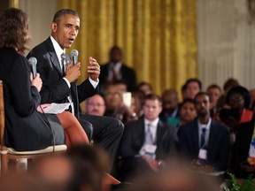 President Barack Obama during a event co-hosted by coworker.org during the White House Summit on Worker Voice in the East Room of the White House in Washington, Wednesday, Oct. 7, 2015. On stage with Obama is Michelle Miller, co-founder of coworker.org. (AP Photo/Andrew Harnik)