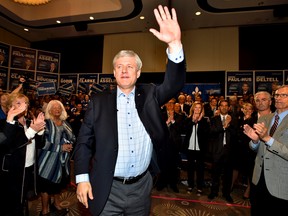 Conservative leader Stephen Harper reacts to the crowed at a rally during a campaign stop in Quebec City on Wednesday, September 30, 2015. A new poll suggests Harper’s Tories are tied for top spot with Thomas Mulcair’s New Democrats among Quebec’s electorate. THE CANADIAN PRESS/Nathan Denette