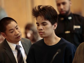 In this  Oct. 28, 2013 file photo, Mingdong Chen is arraigned in Brooklyn criminal court in New York.  Mingdong Chen will serve at least 125 years in prison after pleading guilty Wednesday, Oct.. 7, 2015,  to murder and manslaughter charges. He admitted that he killed his cousin's wife, 37-year-old Qiao Zhen Li, and her children, Linda, 9; Amy, 7; Kevin, 5; and William Zhou, 18 months; in October 2013. (Anthony Lanzilote/The New York Times via AP, Pool, File)