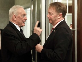 Cowboys owner Jerry Jones (left) and NFL Vice President International Mark Waller confer at the NFL owners meeting in New York on Wednesday, Oct. 7, 2015. (Richard Drew/AP Photo)