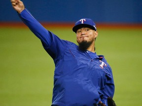 Rangers starting pitcher Yovani Gallardo will pitch in Game 1 of the ALDS against the Blue Jays at the Rogers Centre in Toronto on Thursday. (Stan Behal/Toronto Sun)