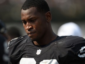 Aldon Smith of the Oakland Raiders looks on during the second half of their NFL game against the Cincinnati Bengals at O.co Coliseum on September 13, 2015 in Oakland, California. (Thearon W. Henderson/AFP)