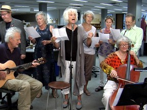 Enjoy as Linda Hoyle, centre, with guitarist Oliver Whitehead and Christine Newland on cello performs at The London Free Press. (MORRIS LAMONT, The London Free Press)