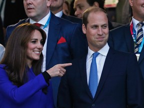 Prince William and Catherine, Duchess of Cambridge, left, watch on during the opening ceremony of a rugby game at Twickenham Stadium, London, England. (Reuters/Russell Cheyne/Livepic)