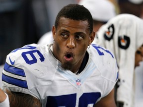 In this Aug. 29, 2015, file photo, Dallas Cowboys defensive end Greg Hardy (76) talks with teammates on the sideline during a preseason NFL game against the Minnesota Vikings in Arlington, Texas. (AP Photo/Brandon Wade, File)