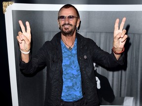 Musician Ringo Starr arrives at "Ringo Star: In Conversation" to discuss his book PHOTOGRAPH on September 25, 2015 in Los Angeles, California.  Kevin Winter/Getty Images/AFP