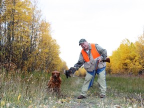 Neil, Penny and a ruffed grouse.