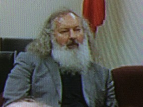 Actor Randy Quaid, in this image shot off of a closed circuit TV monitor, appears at an immigration refugee board hearing in Montreal on Tuesday, May 19, 2015. THE CANADIAN PRESS/Sidhartha Banerjee