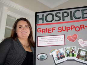 SARAH HYATT/THE INTELLIGENCER
Rachel Pearsall, community relations and fund development co-ordinator for Hospice Quinte, displays a section of the information booth which will be at the Belleville Public Library Friday, as part of World Hospice Day. Staff and volunteers will also have information on programming and services available through hospice.