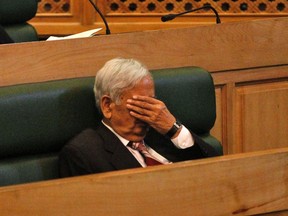 Chief Minister of Jammu and Kashmir state Mufti Mohammad Sayeed gestures as he sits inside the state legislature house in Srinagar, Indian controlled Kashmir, Thursday, Oct. 8, 2015. Lawmakers from India's ruling Hindu nationalist party Bharatiya Janata Party (BJP) in Kashmir kicked and punched Rashid Ahmed, independent member of the state assembly, on Thursday for hosting a party where he served beef. Hindus consider cows to be sacred, and slaughtering the animals is banned in most Indian states. (AP Photo/Mukhtar Khan)