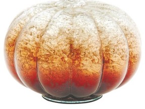 As part of the perfect Harvest table, put out this pumpkin decoration from Ombre.