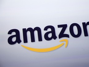 This Sept. 28, 2011, file photo shows the logo for Amazon during a news conference, in New York. (AP Photo/Mark Lennihan, File)