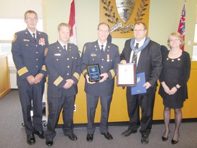 The award for Fire Fighter of the Year was Doug Harkes. From left to right: Steve Gardiner, Huron County fire co-ordinator; Shawn Edwards, fire chief Howick Fire Department; Doug Harkes, Fire Fighter of the Year, Warden Paul Gowing; Brenda Orchard, CAO. (Contributed photo)