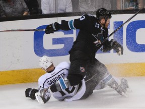 San Jose Sharks left winger Raffi Torres checks Los Angeles Kings right winger Marian Gaborik during a playoff game at SAP Center in San Jose on April 20, 2015. (Kyle Terada/USA TODAY Sports)