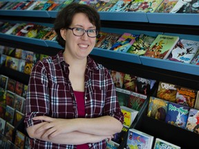 Comet Comics owner Heather MacDonald in her new store on Bank Street in Ottawa on Thursday October 8, 2015. Errol McGihon/Ottawa Sun/Postmedia Network