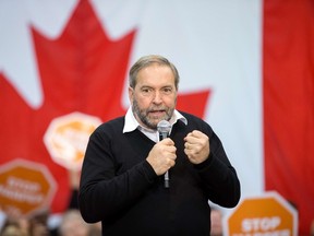 NDP leader Tom Mulcair speaks at a campaign rally in London, Ontario October 4, 2015. New polling showed the former frontrunner in Canada's legislative elections could finish third over its opposition to a popular niqab ban, as political leaders squared off in a final debate October 2. AFP PHOTO/GEOFF ROBINS