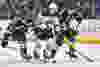 Oct 8, 2015; St. Louis, MO, USA; St. Louis Blues defenseman Carl Gunnarsson (4) and St. Louis Blues defenseman Kevin Shattenkirk (22) pressure Edmonton Oilers center Connor McDavid (97) during the first period at Scottrade Center. Mandatory Credit: Jasen Vinlove-USA TODAY Sports