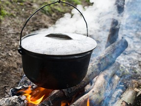 An Italian woman accused of killing a five-year-old by throwing the child into a cauldron of melted cheese is getting a retrial. (Fotolia File Photo)