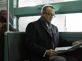 Tom Hanks portrays Brooklyn lawyer James Donovan in a scene from the Steven Spielberg film, "Bridge of Spies." (Jaap Buitendijk/DreamWorks II Distribution Co. via AP)