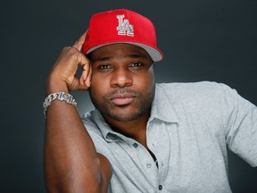 Actor and musician Malcolm-Jamal Warner poses for a portrait Thursday, Oct. 8, 2015, in Los Angeles. (Photo by Danny Moloshok/Invision/AP)