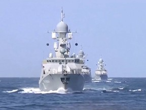 Handout via Reuters
Russian warships are seen sailing in the Caspian Sea in this frame grab taken from footage released by Russia’s Defence Ministry on Oct. 7. The Russian defence ministry said 26 rockets fired by its warships earlier in the day had struck targets associated with Islamic State and Al-Nusra, the Interfax news agency reported.