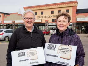 Candice Averill and Sandy Simmie had out brown bags with chewy caramels and Canadian poverty statistics to raise awareness about poverty in Canada on Tuesday, Oct. 6. - Yasmin Mayne, Reporter/Examiner