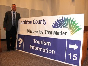 County public works manager Jason Cole shows off a mock-up of a wayfinding sign earlier this week. A Tourism Sarnia-Lambton committee is working on the model for a new locally-run wayfinding signage program, as well as a proposal for a new Lambton County gateway sign. (BARBARA SIMPSON, The Observer)