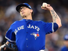Toronto Blue Jays' closer Brett Cecil works against the Texas Rangers during eighth inning of Game 2 of the American League Division Series at Rogers Centre in Toronto on Oct. 9, 2015. (THE CANADIAN PRESS/Frank Gunn)