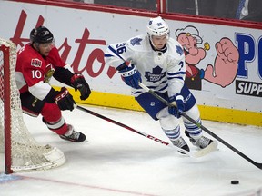 Ottawa Senators left wing Shane Prince (10) chases Toronto Maple Leafs defenseman Scott Harrington (36) in the third period at Canadian Tire Centre. The Maple Leafs defeated the Senators 4-3 in overtime. Mandatory Credit: Marc DesRosiers-USA TODAY Sports