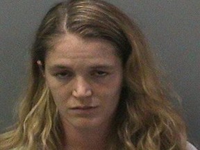 Meghan Breanna Alt is pictured in this undated booking photo provided by the Orange County Sheriff�s Department, October 9, 2015. Alt, a 25-year-old former beauty queen was charged in Southern California on Friday with distributing pornographic photos of a 4-year-old girl who is her relative, prosecutors said. REUTERS/Orange County Sheriff's Department/Handout via Reuters