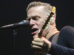 Bryan Adams plays at the Calgary Saddledome in Calgary in this January 16, 2015 file photo. (Mike Drew/Postmedia Network)