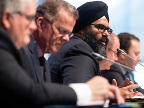 Calgary-Greenway MLA Manmeet Bhullar (right) and other PC MLA's answer questions from the audience during the Alberta Association of Municipal Districts and Counties (AAMDC) Spring 2015 Convention at the Shaw Conference Centre, in Edmonton Alta., on Wednesday March 17, 2015. David Bloom/Edmonton Sun