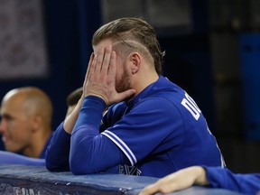 Blue Jays third baseman Josh Donaldson watches from the dugout in this file photo. (Craig Robertson/Postmedia Network)