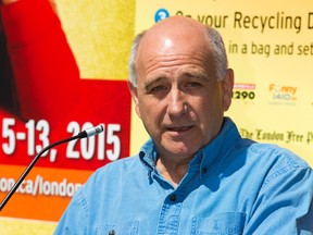 London foodbank co-executive director Glen Pearson speaks during the kickoff for the annual London Cares Curbside Food Drive at the London Food Bank on Wednesday June 3, 2015. 
Mike Hensen/The London Free Press/Postmedia Network