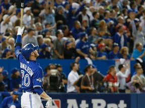 Josh Donaldson of the Toronto Blue Jays watches a foul ball in the 13th inning against the Texas Rangers during Game 2 of the American League Division Series at Rogers Centre in Toronto on Oct. 9, 2015. (Stan Behal/Toronto Sun/Postmedia Network)