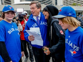 Mayor John Tory gave tickets to the Nastamagou family. (DAVE THOMAS, Toronto Sun)