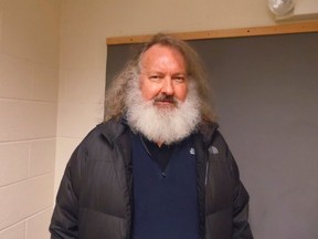 In a photo provided by the Vermont State Police, actor Randy Quaid stands in the Vermont State Police barracks in St. Albans, Vt., Friday, Oct. 9, 2015. State Police say Quaid has been taken into custody while trying to cross from Canada into the United States. State Police say the "Independence Day" actor was detained by troopers at the Highgate Springs port of entry, days after Canadian officials said he would be deported. Quaid is wanted in Santa Barbara, Calif., to face felony vandalism charges filed in 2010 after he and his wife, Evi, were found squatting in a guesthouse of a home they previously owned. (Vermont State Police via AP)