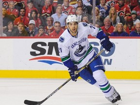 Brandon Sutter began the season as skating on the right wing with Daniel and Henrik Sedin, making the most of it with a goal and an assist. (AFP)