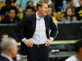 Chicago Bulls head coach Fred Hoiberg directs his team against the Denver Nuggets in the first half of an NBA preseason basketball game Thursday, Oct. 8, 2015, in Boulder, Colo. (AP Photo/David Zalubowski)