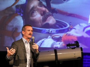 Col. Chris Hadfield, delivers the Glencore Memorial Lecture Series at Laurentian University in Sudbury, Ont. on Friday October 9, 2015 to about 1,300 people. Hadfield was the first Canadian to be a space mission specialist, to operate the Canadarm in orbit, to do a spacewalk, to command the International Space Station and to record a music video in space.Gino Donato/Sudbury Star/Postmedia Network