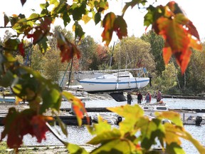 Sudbury Yacht Club members crane out their boats in Sudbury, Ont. on Friday October 9, 2015. The forecast for Sunday and Monday calls for sun and cloud and a high of 19. Gino Donato/Sudbury Star/Postmedia Network