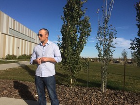 Ryan Pleckaitis, director of complaints with the City of Edmonton, speaks to media outside the Terwillegar Rec Centre on Saturday about a court injunction to stop an unlicensed business and unsightly property at 7805 114 Street. The owner had been operating a yard sale for three months, while the city bylaws only permit yard and garage sales for three consecutive days three times during a calendar year.
Photo by Catherine Griwkowsky/Edmonton Sun