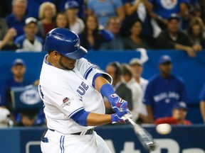 Edwin Encarnacion of the Toronto Blue Jays at bat against the Texas Rangers in Game 1 of the American League Division Series in Toronto, Ont. on Thursday October 8, 2015. STAN BEHAL/Toronto Sun/Postmedia Network