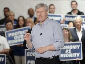 Prime Minister Stephen Harper unveils his low-tax, balanced-budget plan on the campaign trail in Richmond, B.C., October 9, 2015 (Nick Procaylo/Vancouver Province/Postmedia Network)