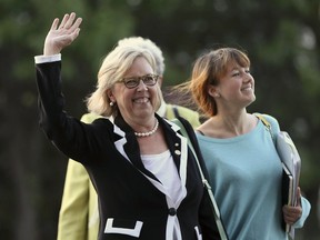 Green Party leader Elizabeth May, left, arrives for the French language leaders' debate in Montreal, Quebec September 24, 2015. REUTERS/Christinne Muschi